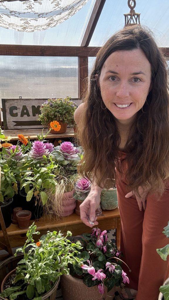 girl with calendula and ornamental cabbage kale 
