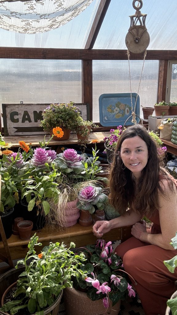 girl with calendula and ornamental cabbage kale