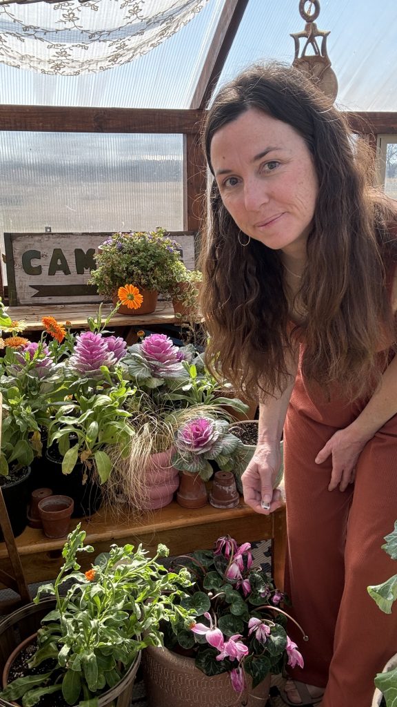 girl with her calendula and ornamental cabbage kale